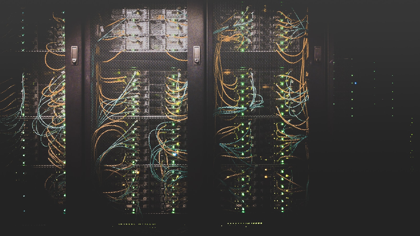 Server racks and network cabling inside a data center